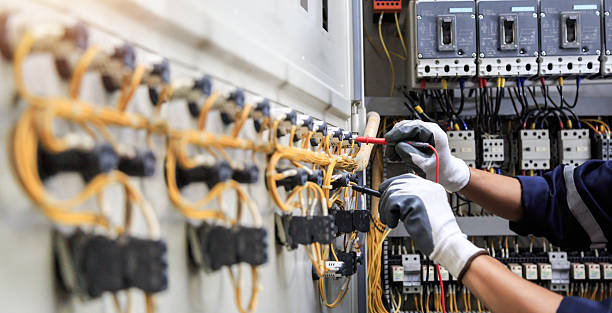 Professional Electrician technician working in Mays Chapel, MD
